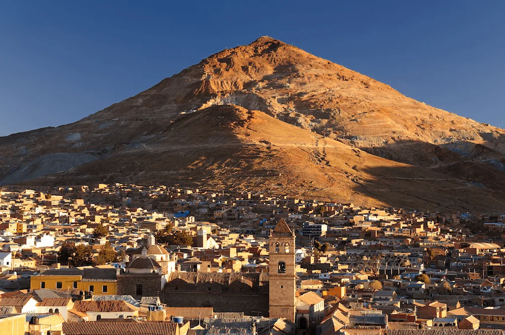 Figure 1: Views of Cerro Rico and the city of Potosí at its feet. Source.